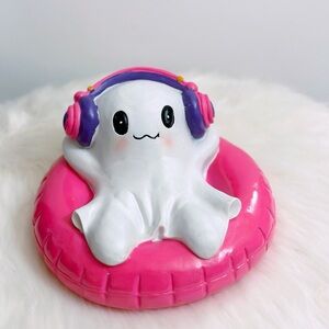 Halloween Summerween Ghost Wearing Headphones in a Pool Float